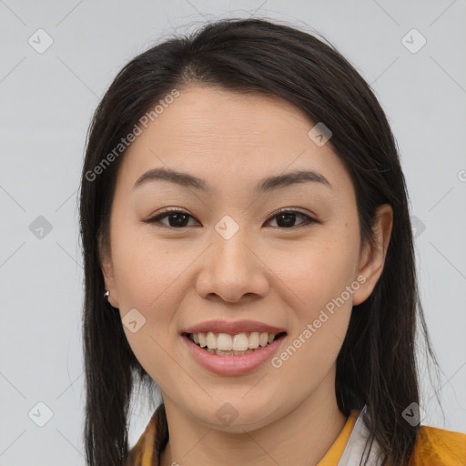 Joyful white young-adult female with long  brown hair and brown eyes