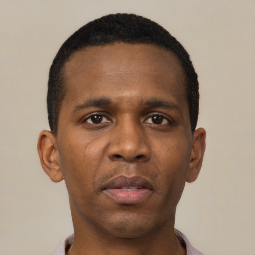 Neutral black young-adult male with short  black hair and brown eyes