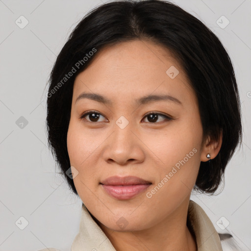 Joyful asian young-adult female with medium  brown hair and brown eyes