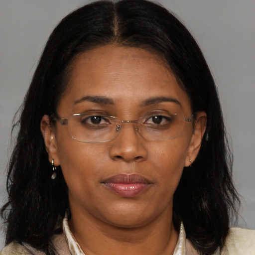 Neutral black adult female with medium  brown hair and brown eyes