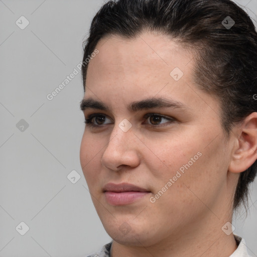 Joyful white young-adult female with short  brown hair and brown eyes