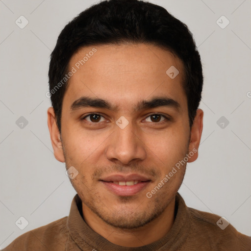 Joyful latino young-adult male with short  black hair and brown eyes