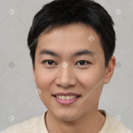 Joyful asian young-adult male with short  brown hair and brown eyes