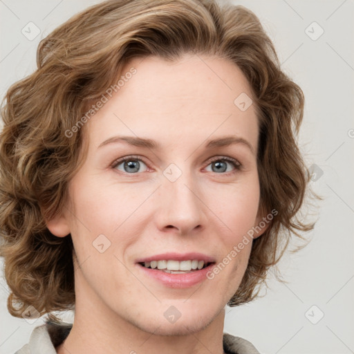 Joyful white young-adult female with medium  brown hair and blue eyes