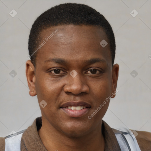 Joyful black young-adult male with short  brown hair and brown eyes