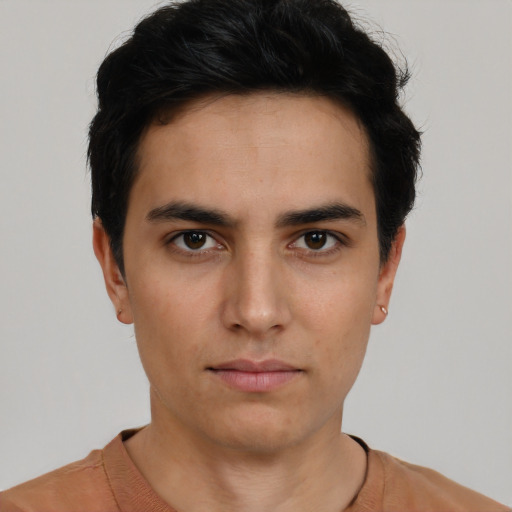 Neutral white young-adult male with short  black hair and brown eyes