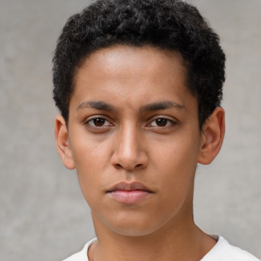 Neutral latino young-adult male with short  brown hair and brown eyes