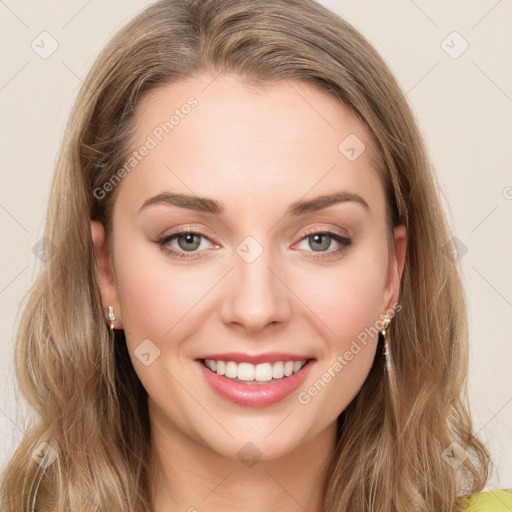 Joyful white young-adult female with long  brown hair and green eyes