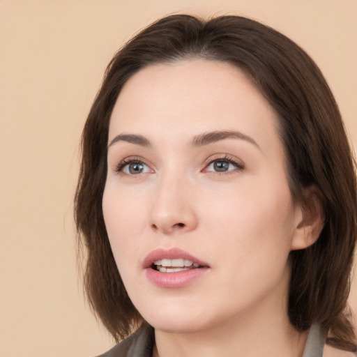 Neutral white young-adult female with medium  brown hair and brown eyes