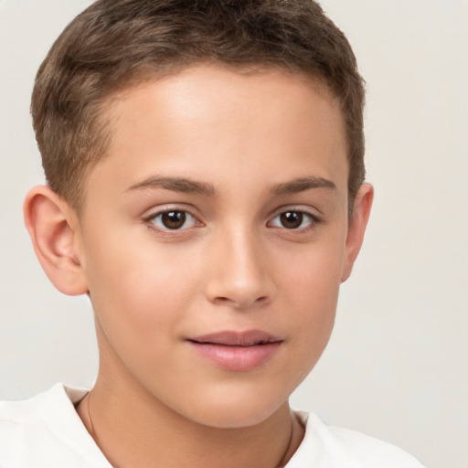 Joyful white child male with short  brown hair and brown eyes