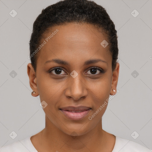 Joyful black young-adult female with short  brown hair and brown eyes