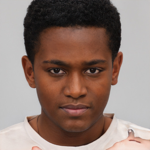 Neutral black young-adult male with short  brown hair and brown eyes