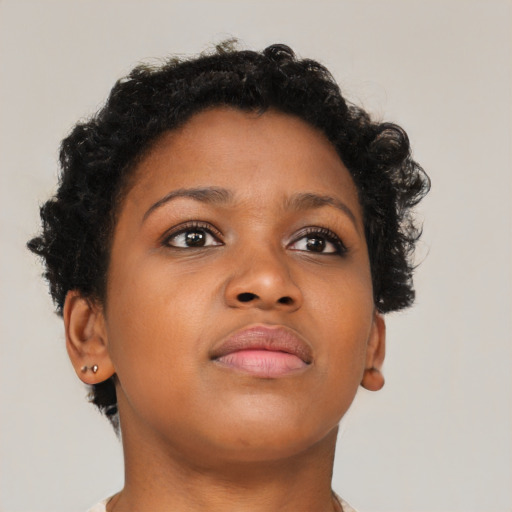 Neutral black young-adult female with short  brown hair and brown eyes