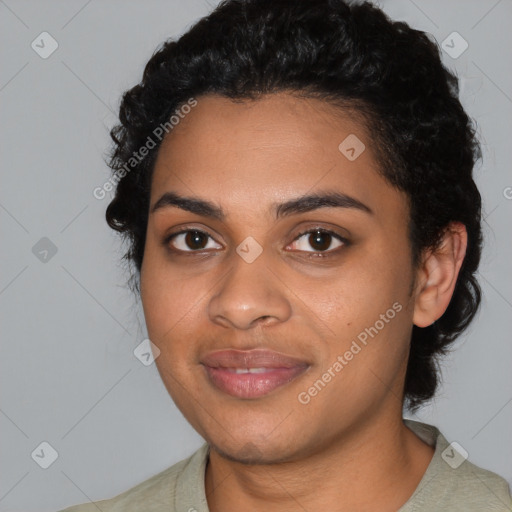 Joyful latino young-adult female with short  black hair and brown eyes