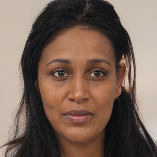 Joyful asian young-adult female with long  black hair and brown eyes