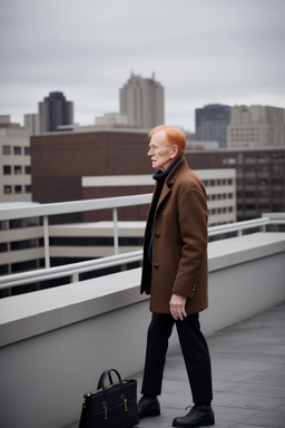 Elderly male with  ginger hair