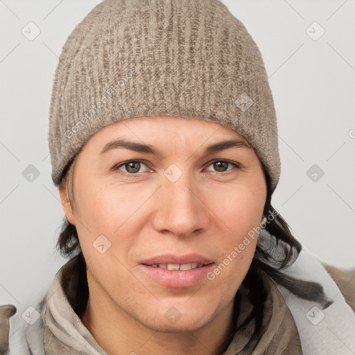 Joyful white young-adult female with short  brown hair and grey eyes