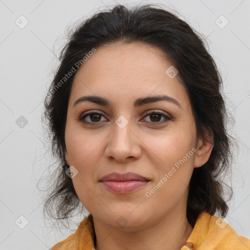 Joyful latino young-adult female with long  brown hair and brown eyes