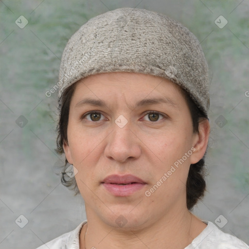 Joyful white adult female with medium  brown hair and brown eyes