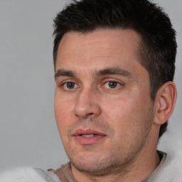 Neutral white adult male with short  brown hair and brown eyes