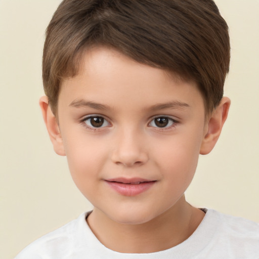 Joyful white child male with short  brown hair and brown eyes