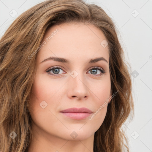 Joyful white young-adult female with long  brown hair and green eyes