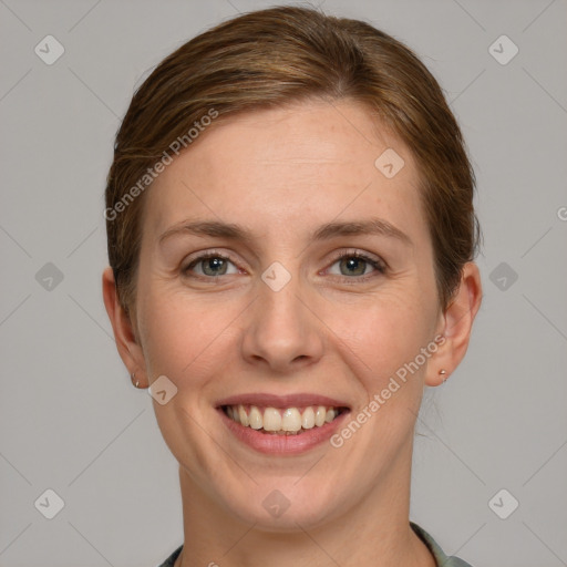 Joyful white young-adult female with medium  brown hair and blue eyes