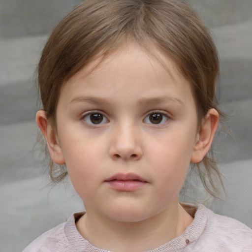 Neutral white child female with medium  brown hair and brown eyes