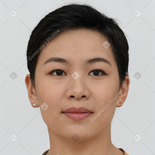 Joyful asian young-adult female with short  brown hair and brown eyes