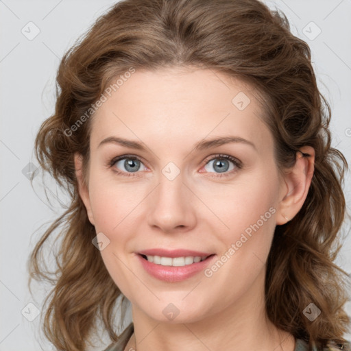 Joyful white young-adult female with medium  brown hair and blue eyes