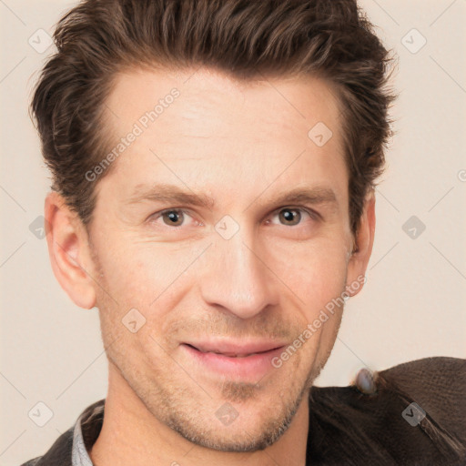 Joyful white adult male with short  brown hair and grey eyes