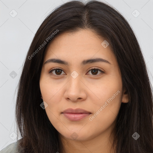 Joyful latino young-adult female with long  brown hair and brown eyes