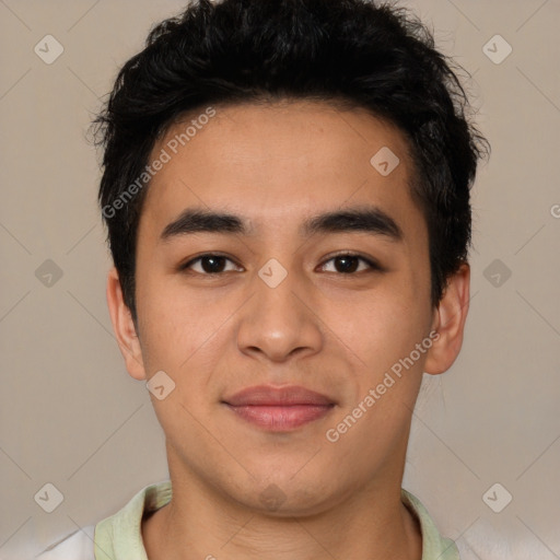 Joyful latino young-adult male with short  brown hair and brown eyes