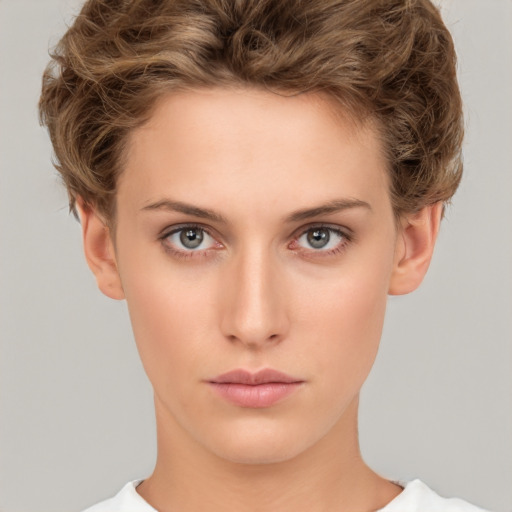 Neutral white young-adult female with short  brown hair and brown eyes