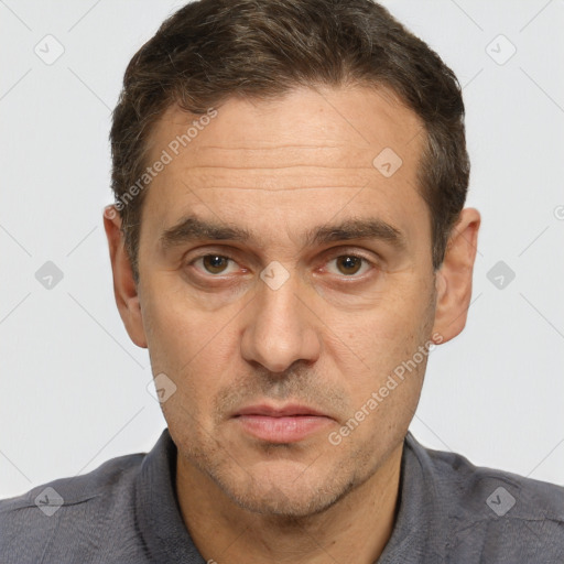 Neutral white adult male with short  brown hair and brown eyes