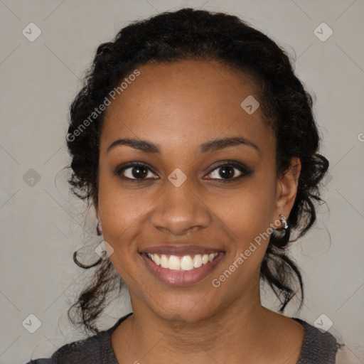 Joyful black young-adult female with medium  black hair and brown eyes