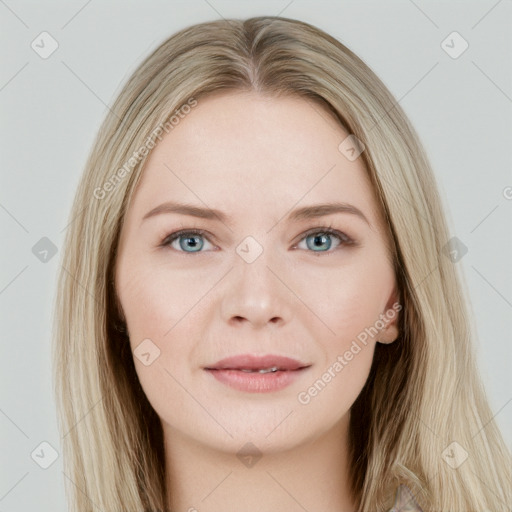 Joyful white young-adult female with long  brown hair and green eyes