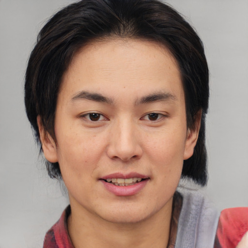 Joyful asian young-adult female with medium  brown hair and brown eyes