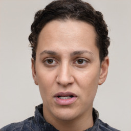 Joyful white adult female with short  brown hair and brown eyes