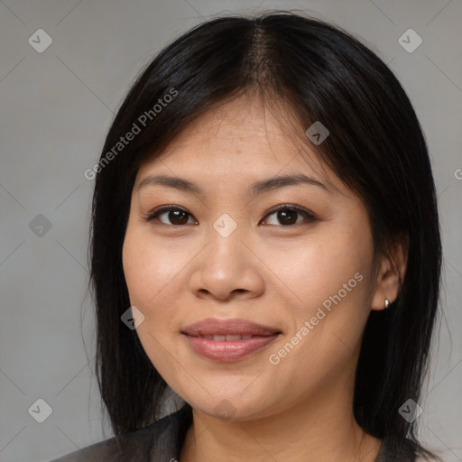 Joyful asian young-adult female with medium  brown hair and brown eyes