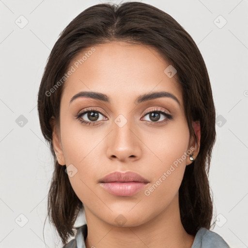 Neutral white young-adult female with long  brown hair and brown eyes