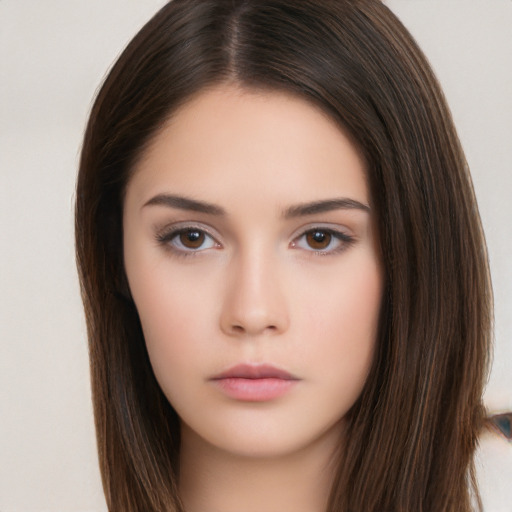 Neutral white young-adult female with long  brown hair and brown eyes