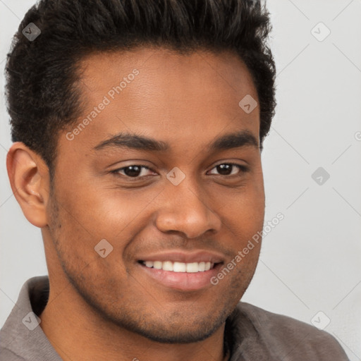 Joyful black young-adult male with short  brown hair and brown eyes