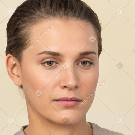 Neutral white young-adult female with short  brown hair and brown eyes