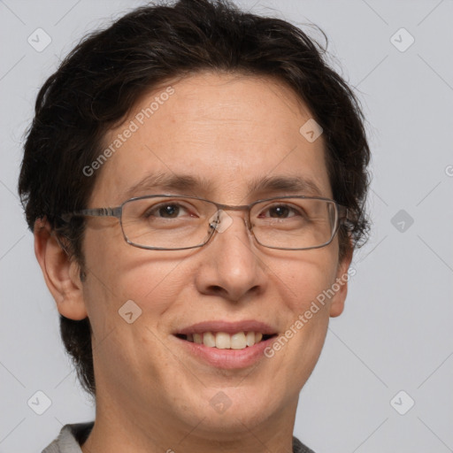 Joyful white adult female with short  brown hair and grey eyes