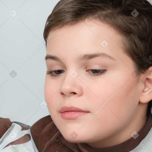 Joyful white child female with short  brown hair and brown eyes