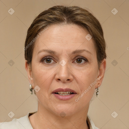 Joyful white adult female with short  brown hair and brown eyes