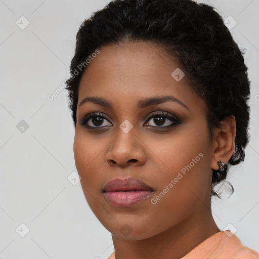 Joyful latino young-adult female with short  black hair and brown eyes