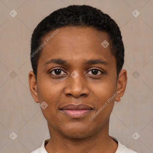 Joyful black young-adult male with short  black hair and brown eyes