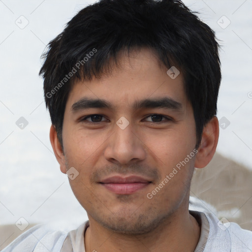 Joyful asian young-adult male with short  black hair and brown eyes